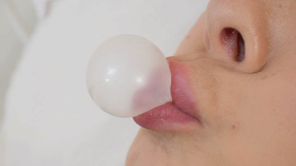 Schoolgirl Blowing Bubble Gum